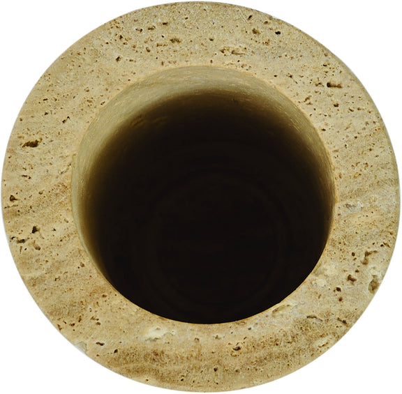 Beige travertine vase top view with dark interior opening