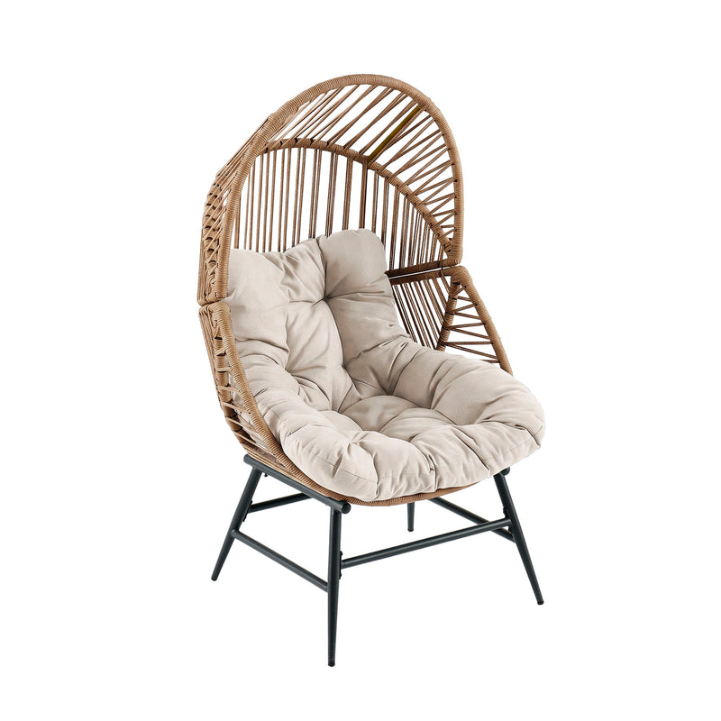 Light brown rattan lounge chair with beige padded cushion and black metal legs