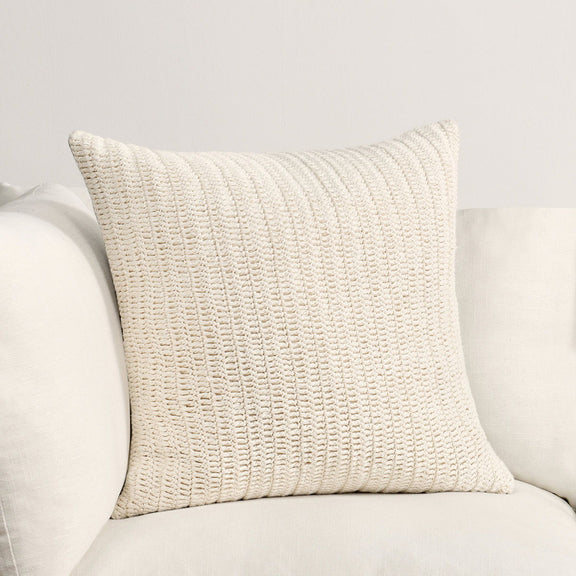 Ivory textured knit square pillow with raised stitched pattern