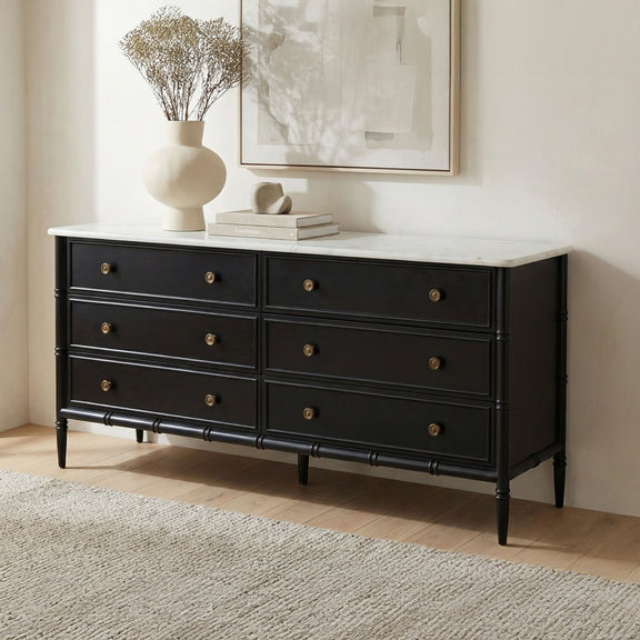 Black 6-drawer dresser with white countertop, brass knobs, fluted drawer fronts and legs