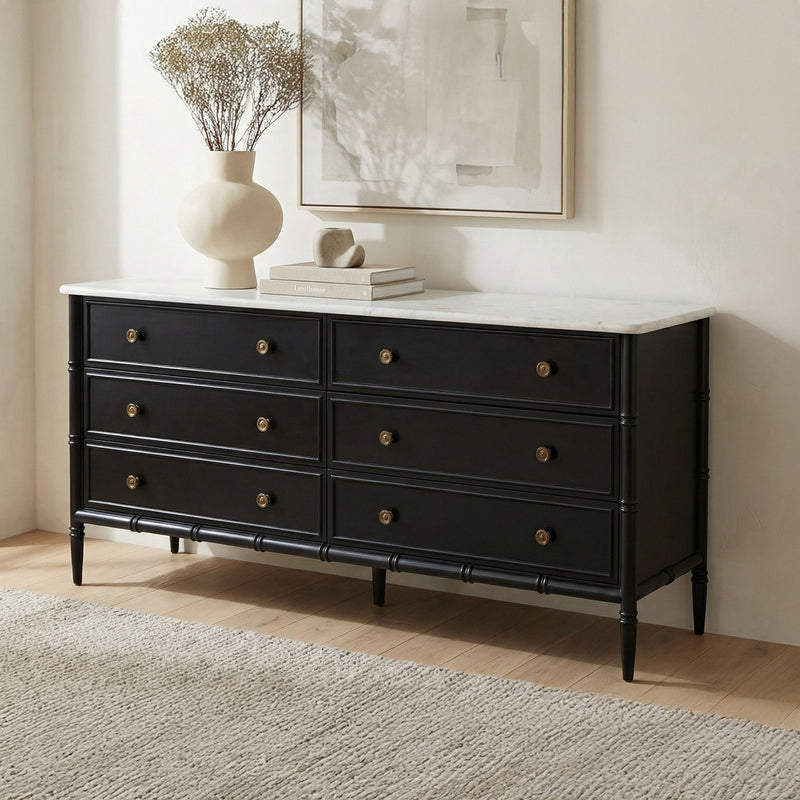 Black 6-drawer dresser with white countertop, brass knobs, fluted drawer fronts and legs