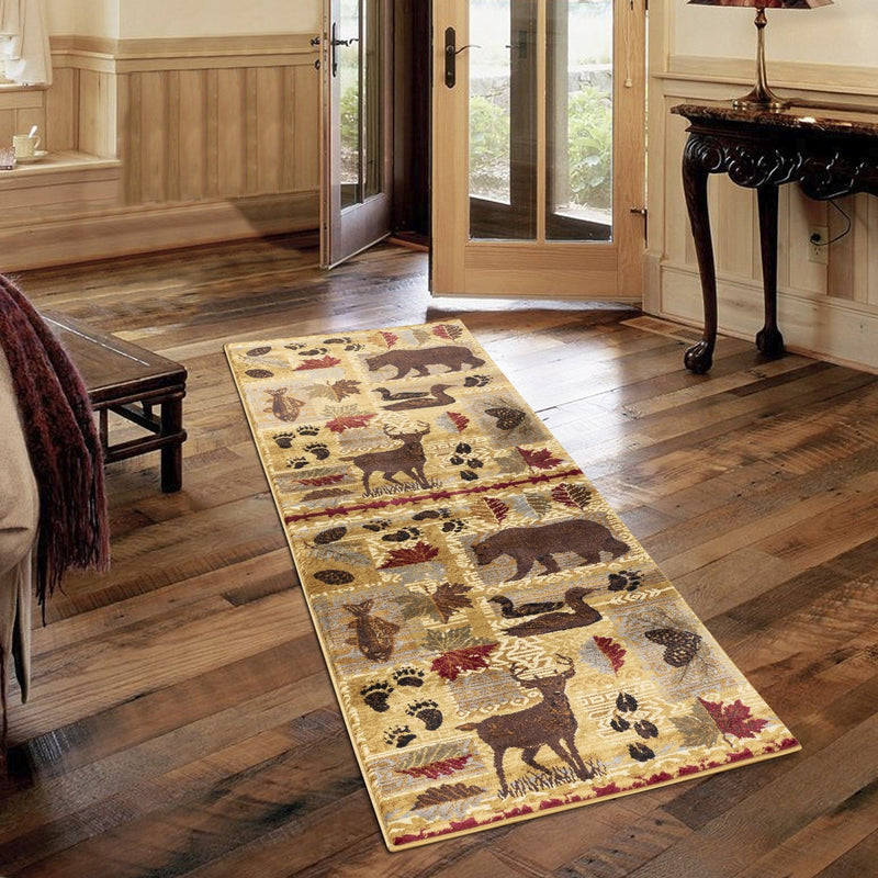 Beige lodge-style area rug with animal and leaf motifs, rectangular border