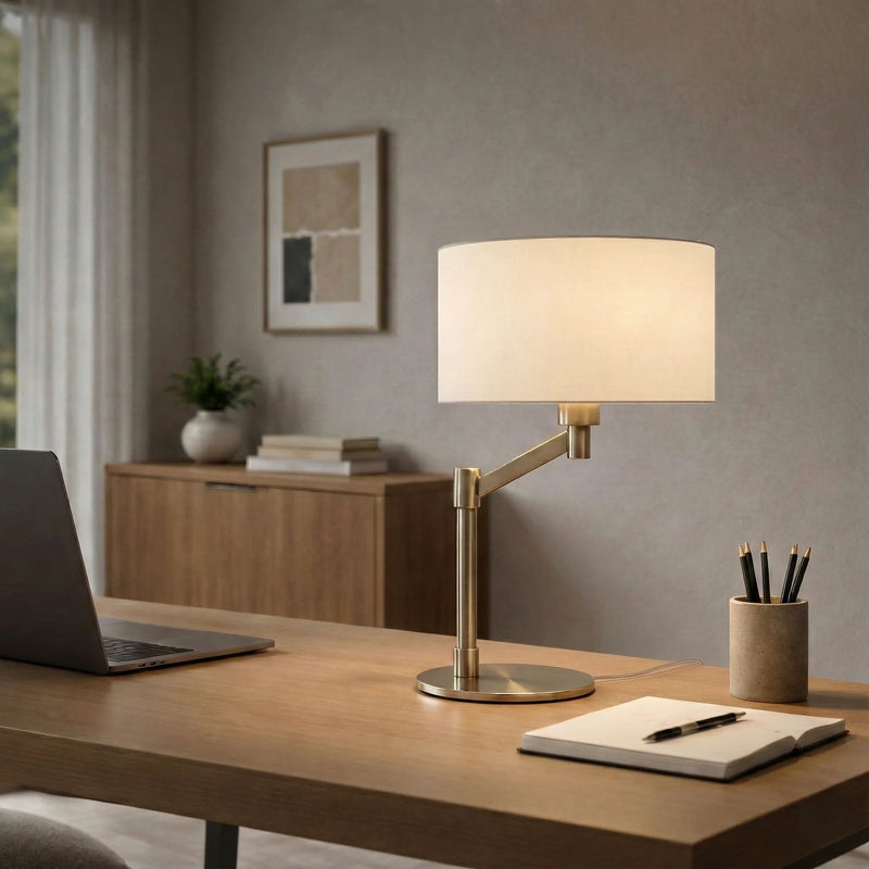 Table lamp with white linen shade and brushed nickel curved base, on/off switch