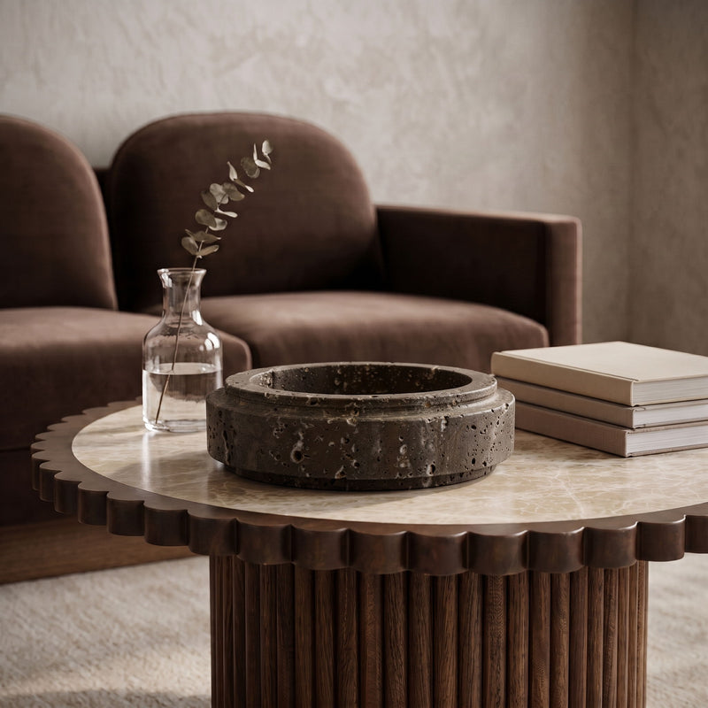 Parsons travertine bowl in dark gray, speckled exterior on tabletop