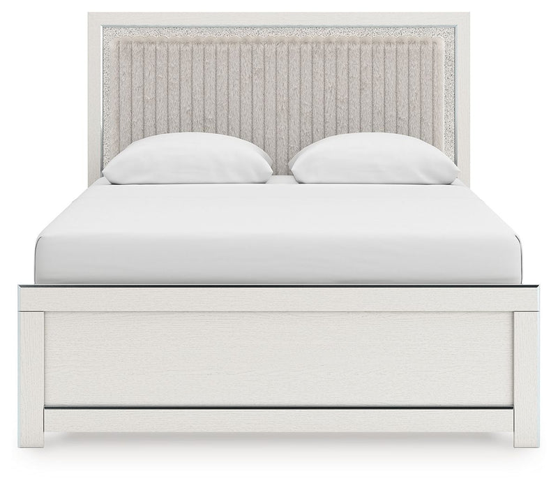 Upholstered panel bed with white frame and light gray upholstered headboard, front close-up.