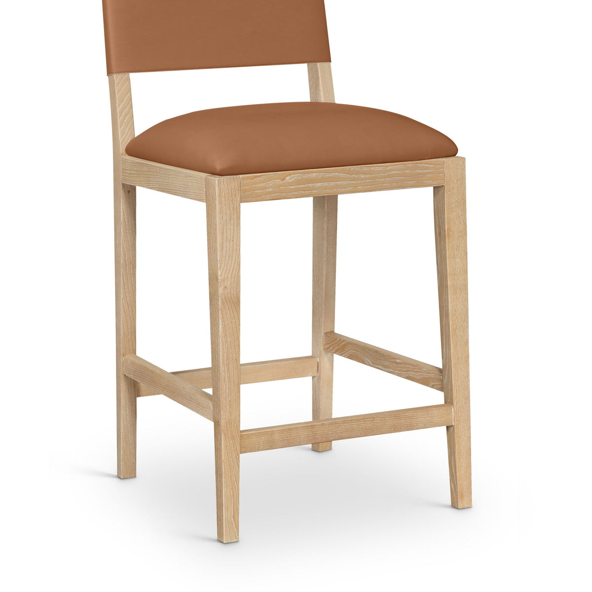 Light brown vegan leather counter stool with cushioned seat, wood legs, square back