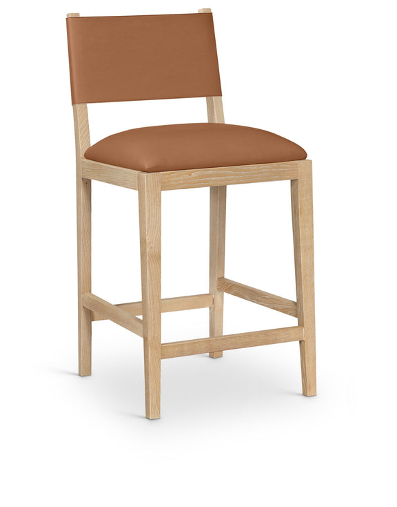 Light brown vegan leather counter stool with cushioned seat, wood legs, square back