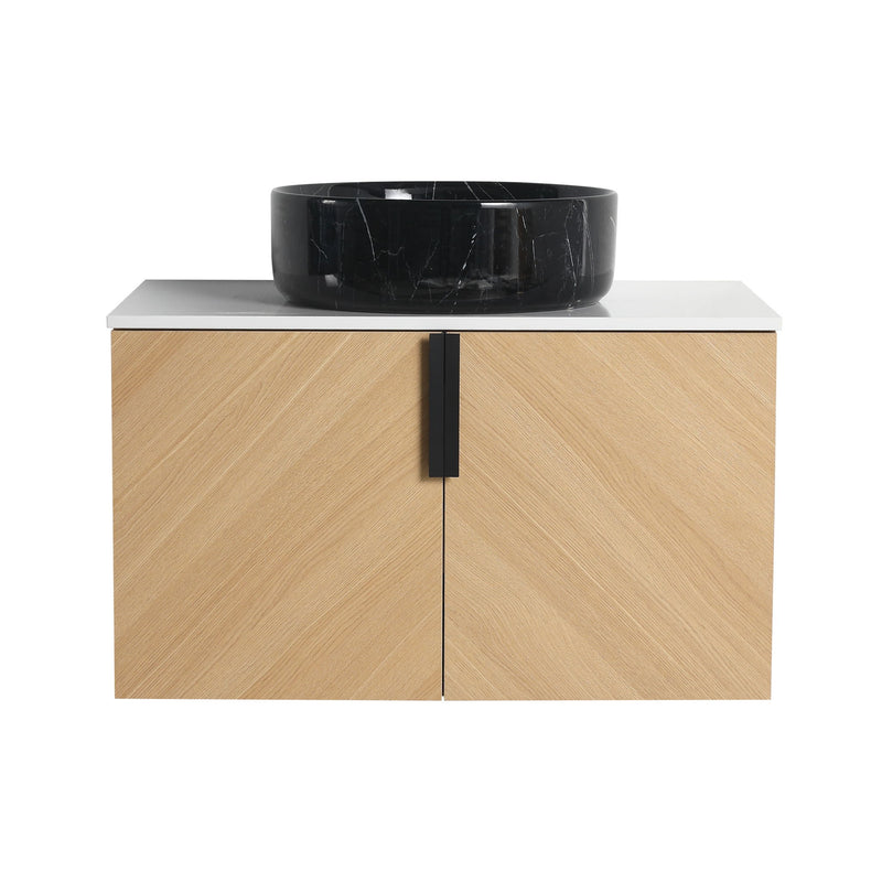 Wall-mounted bathroom vanity with light wood cabinet, white countertop, and black vessel sink