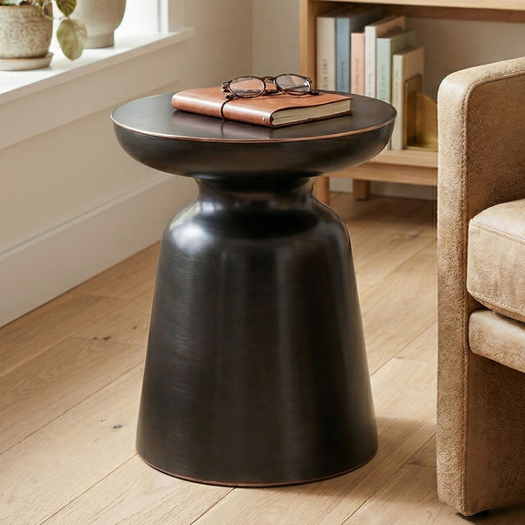 Dark metal round bell accent table with flared top and tapered pedestal