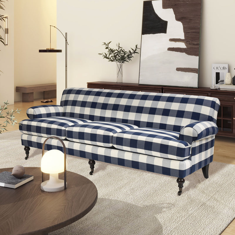 Blue and white plaid three-cushion tightback sofa with rolled arms and turned legs.