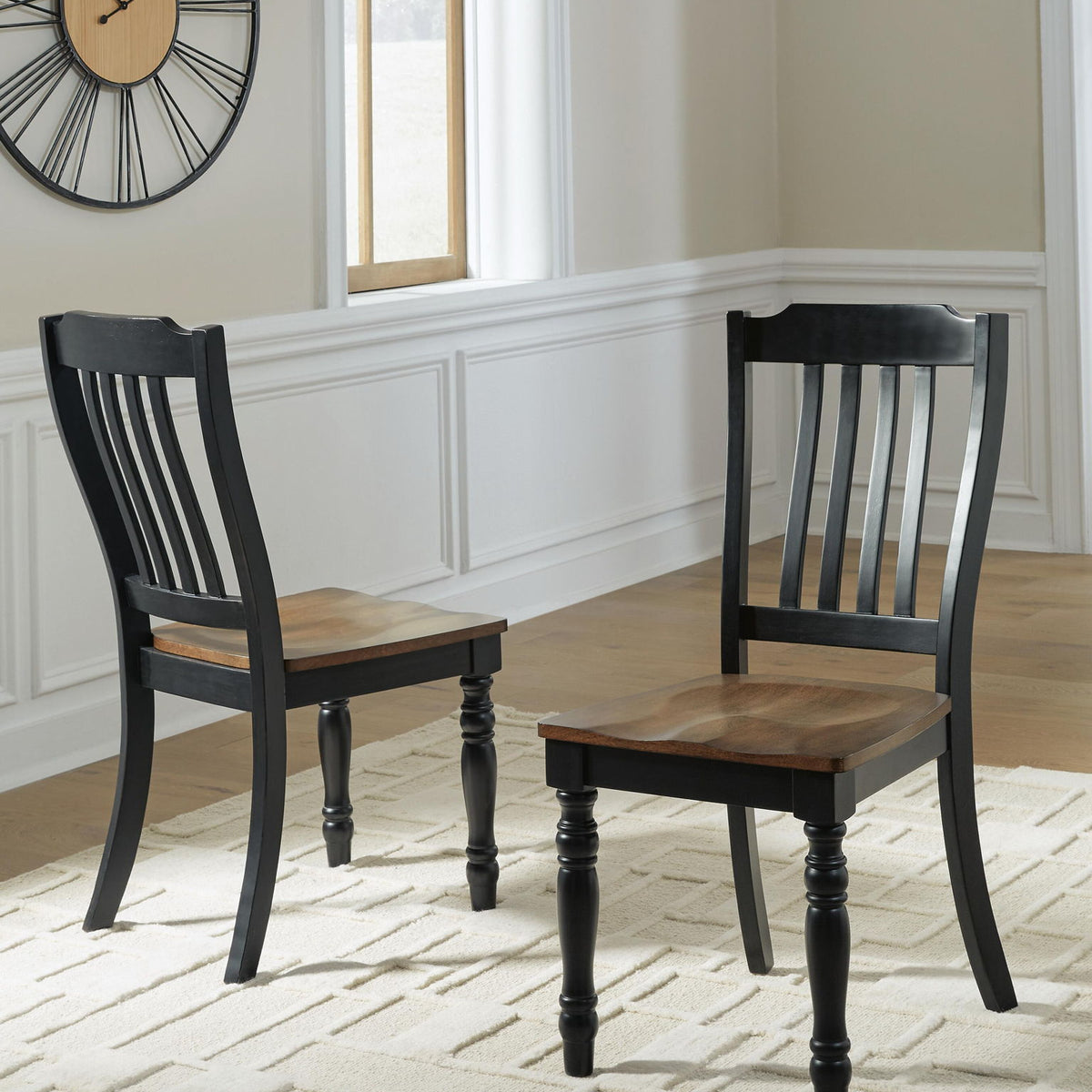 Set of 2 black dining side chairs with vertical slat backs and brown seats