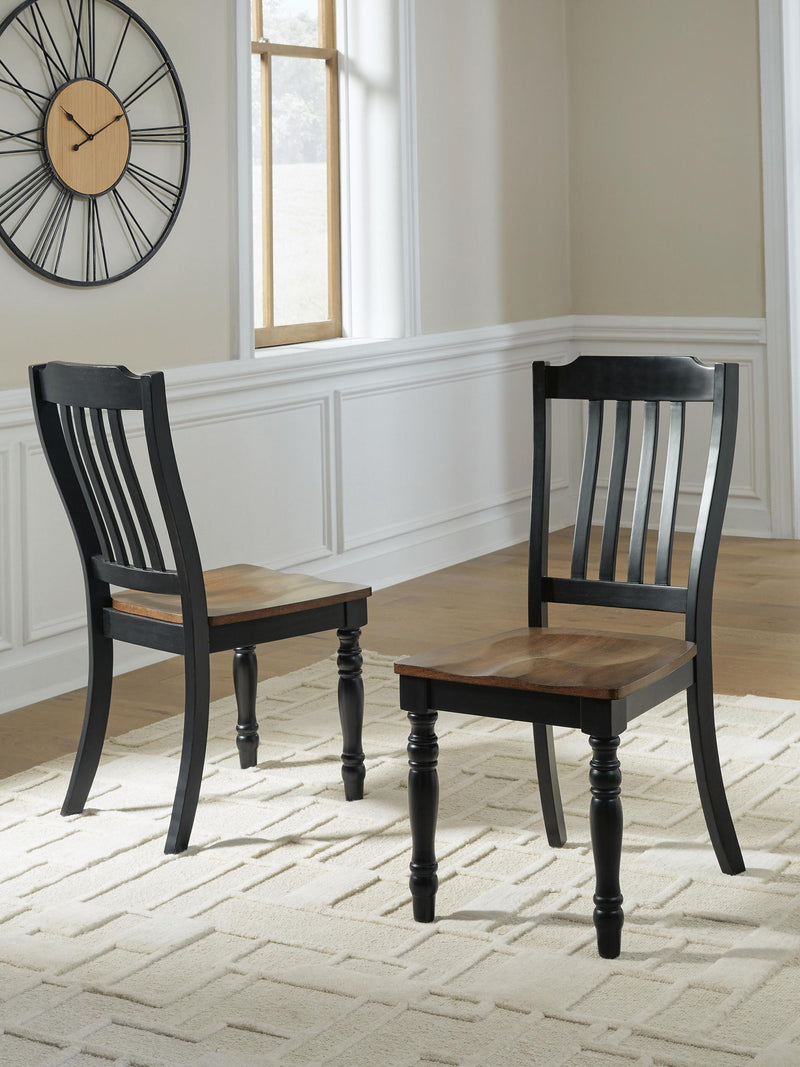 Set of 2 black dining side chairs with vertical slat backs and brown seats