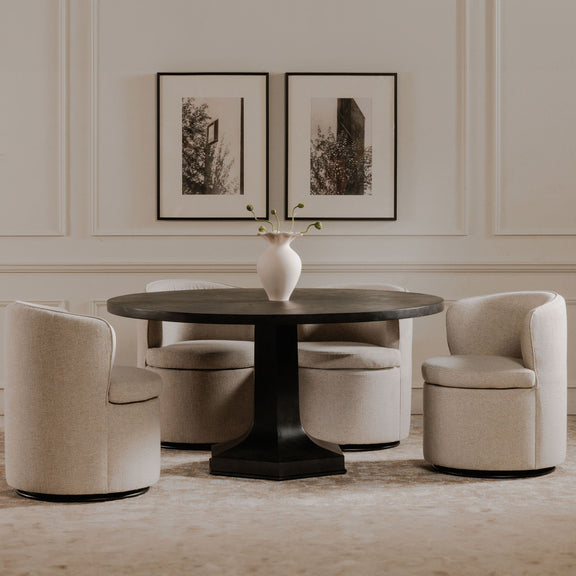Oatmeal swivel chair with rounded arms and smooth upholstered seat