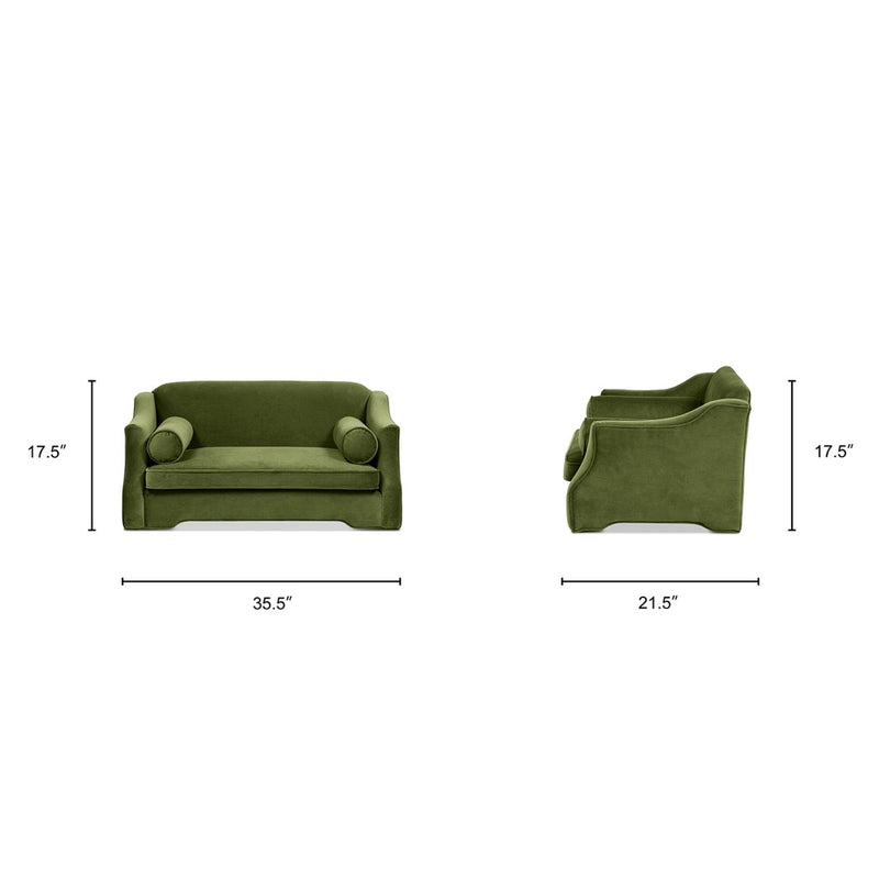 Green fabric dog sofa bed with rolled arms and two cushioned bolsters
