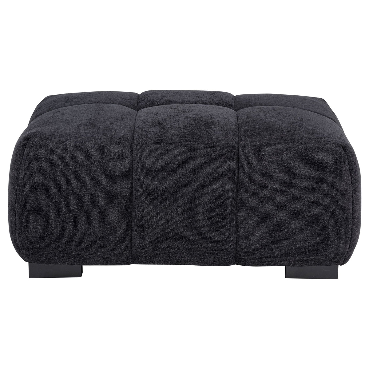 Dark gray rectangular upholstered ottoman with tufted top panels and low black legs.