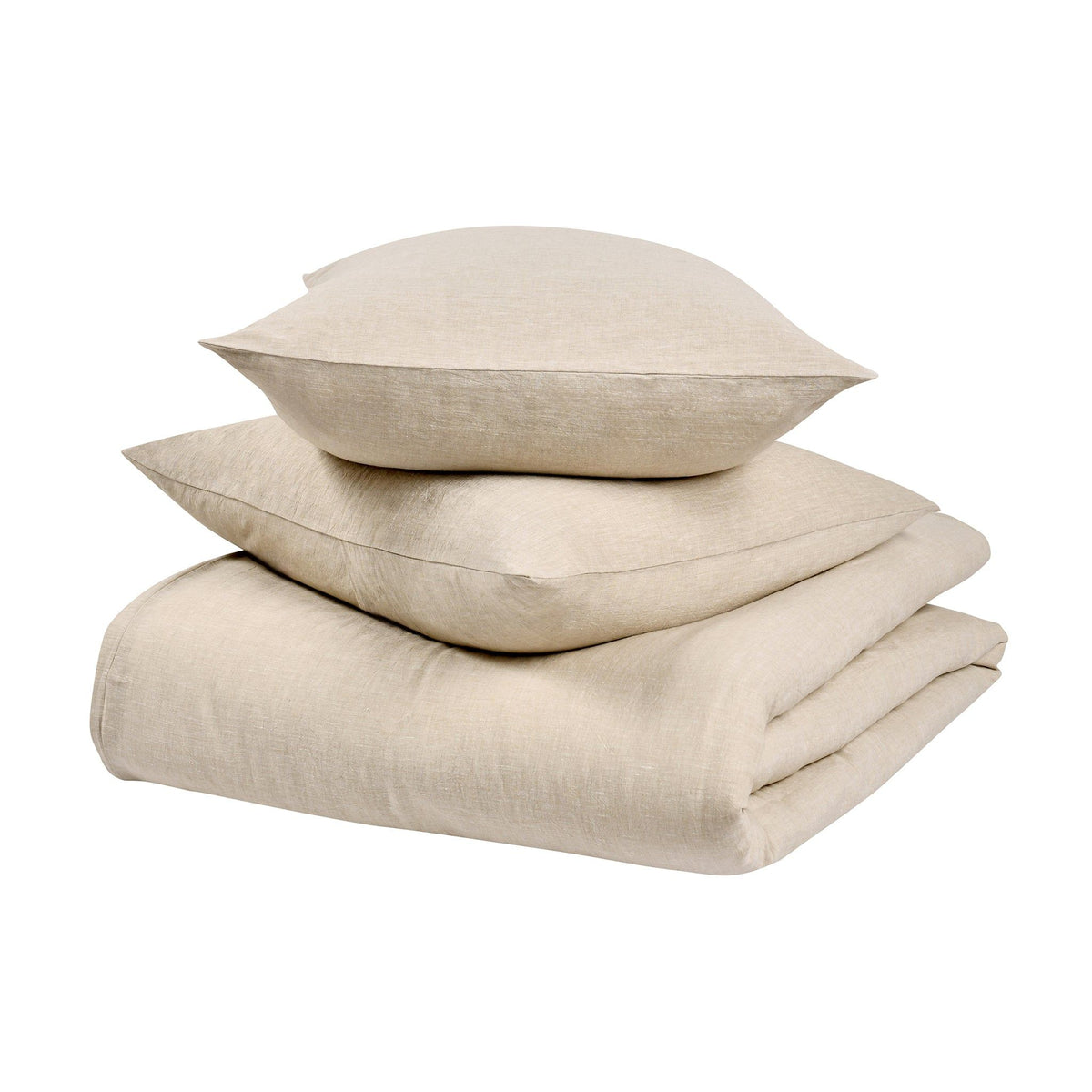 Linen-cashmere sham in natural beige, stacked on matching bedding