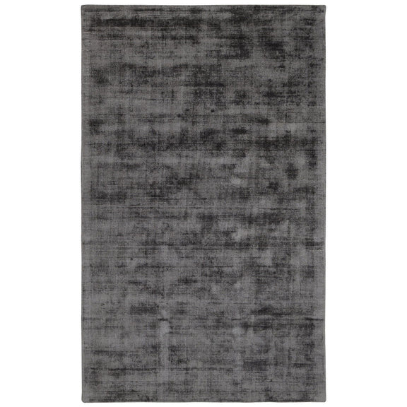 Charcoal gray distressed area rug with washed, mottled pattern and flat, low pile.