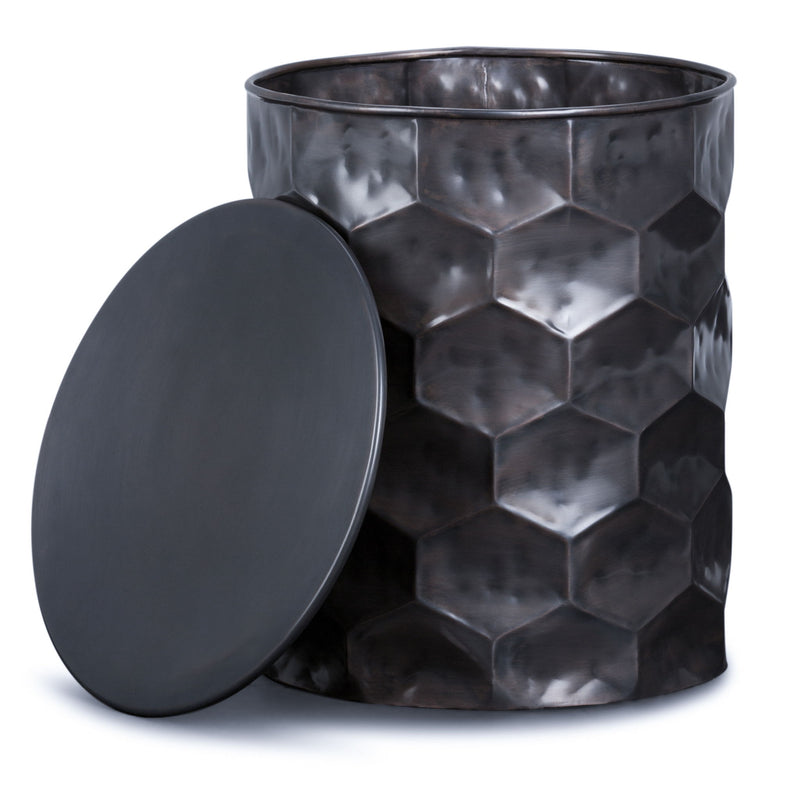 Round dark metal storage drum table with hinged lid open, faceted hex pattern