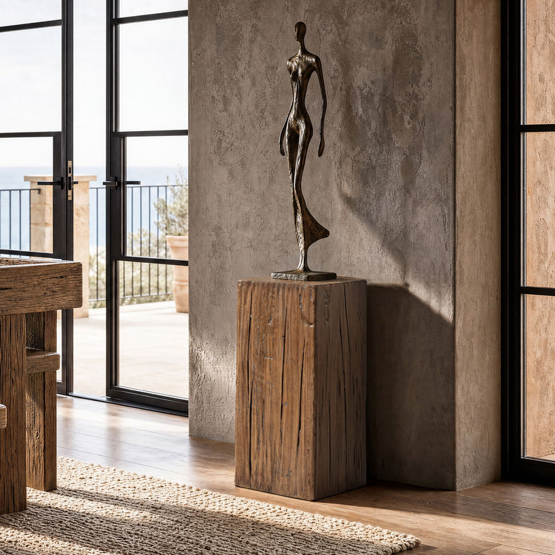 Tall dark brown wood side table with a square top and rustic vertical grain
