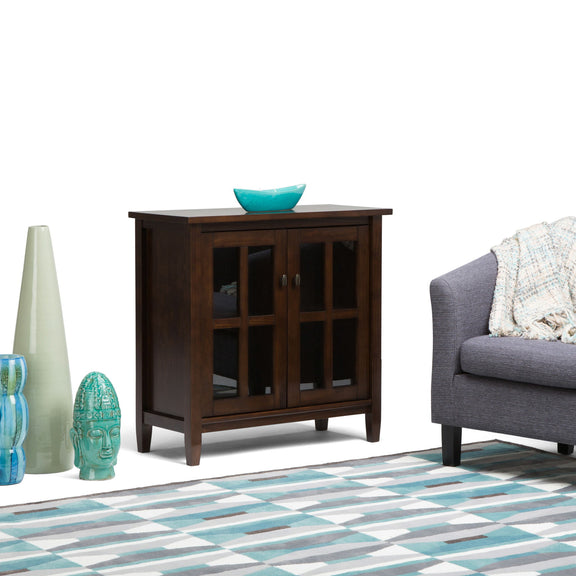 Dark brown shaker-style low storage cabinet with two glass-paneled doors