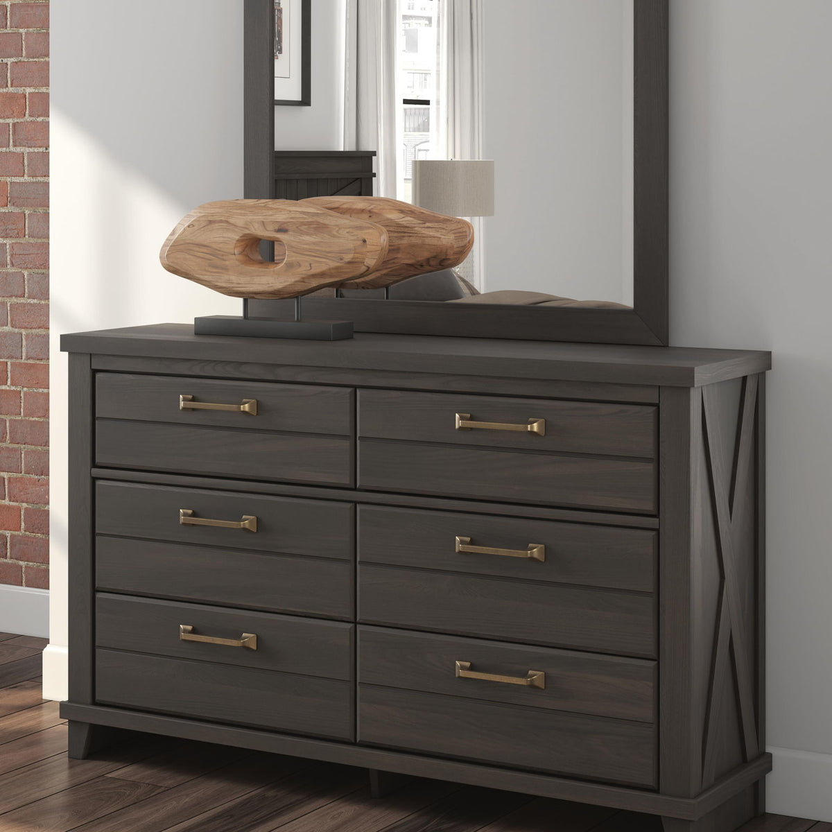 Dark brown six-drawer dresser with matching framed mirror, shown in a room setting