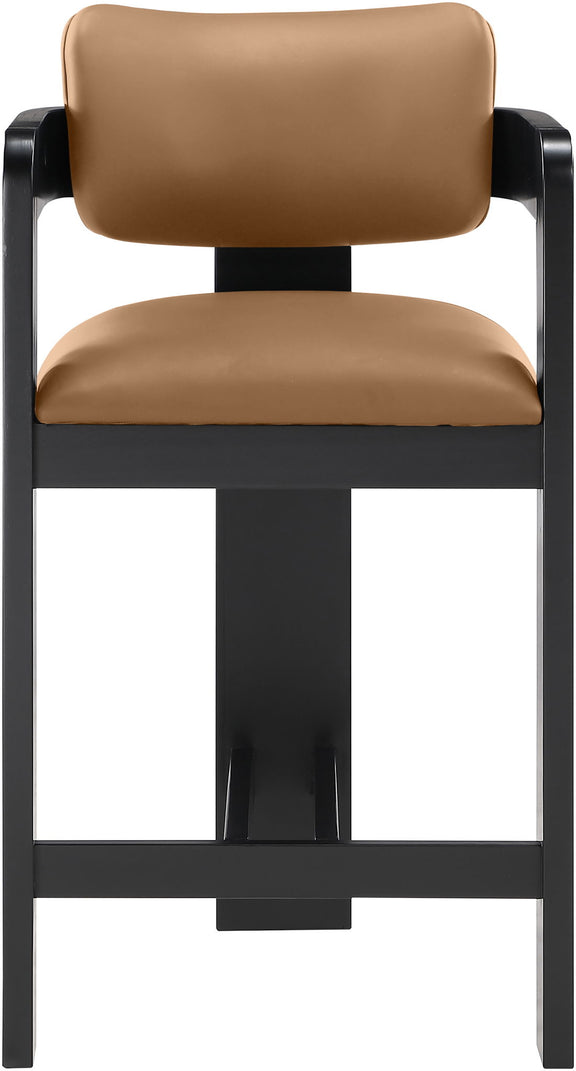Vegan leather counter stool with tan upholstered back and black ribbed frame