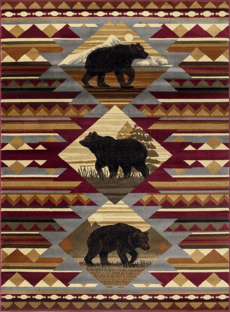 Red lodge area rug with geometric diamonds and black bear motifs, bordered edges