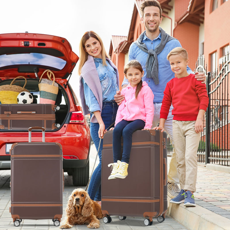 Dark brown hard-shell spinner suitcases with telescoping handles and four wheels