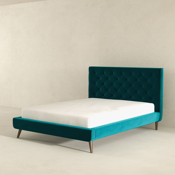 Dillon platform bed with tufted teal headboard and white mattress