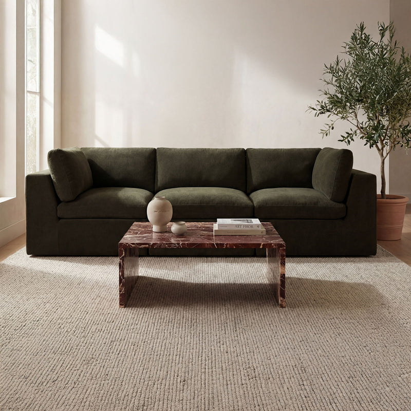 Dark green modular sectional sofa with corner chaise, thick seat cushions