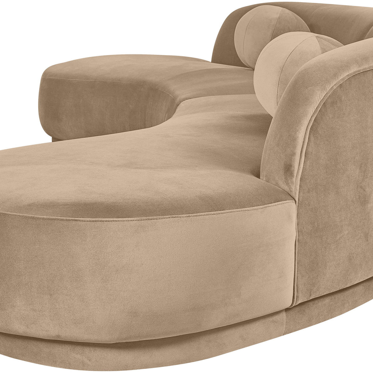 Tan velvet sectional sofa with rounded arms and plush seat cushions