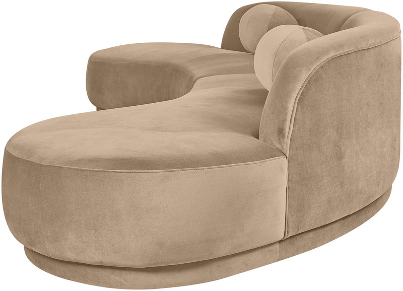Tan velvet sectional sofa with rounded arms and plush seat cushions