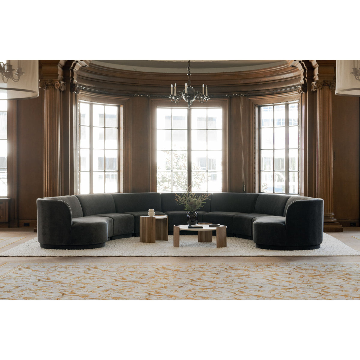 Natural wood round coffee table with marble-look top and angled side supports