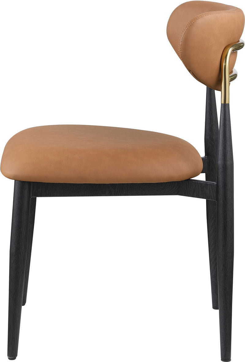 Upholstered dining side chair with light brown seat and rounded back, black legs