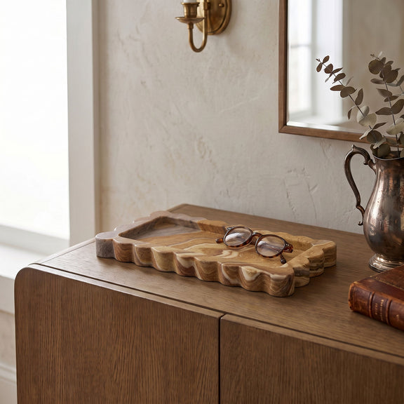 Light brown genuine marble tray with scalloped edges and rectangular center well.