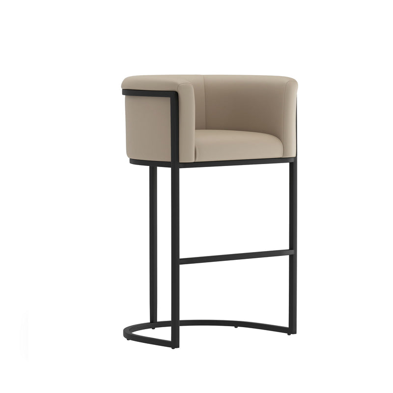 Light brown upholstered barstool with black metal frame and curved footrest