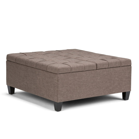 Upholstered storage ottoman coffee table with tufted top in light brown fabric