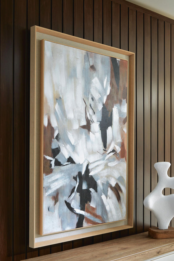 Framed abstract wall art featuring white, black, and tan textured strokes