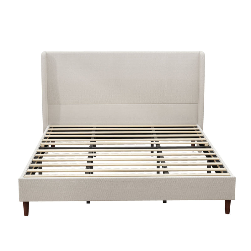 Beige bed frame with padded high headboard and slatted base