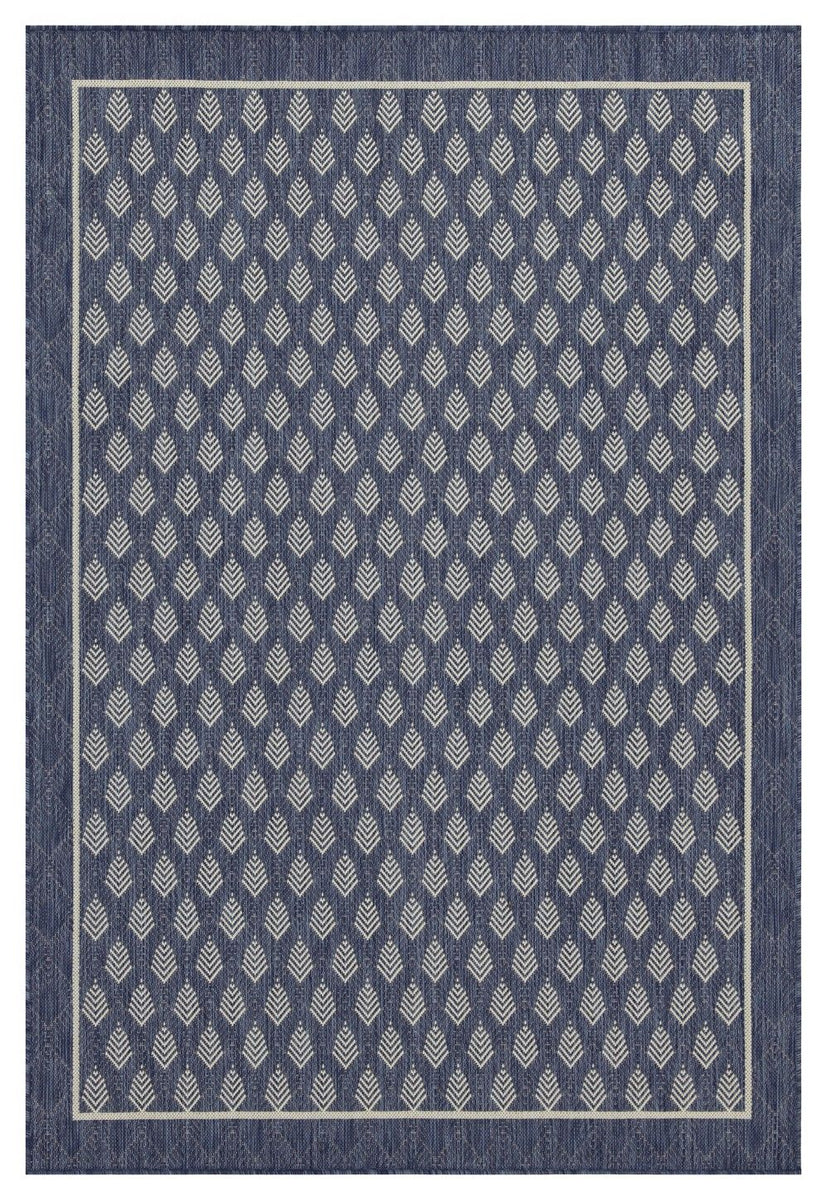 Blue area rug with repeating diamond pattern and dark outer border