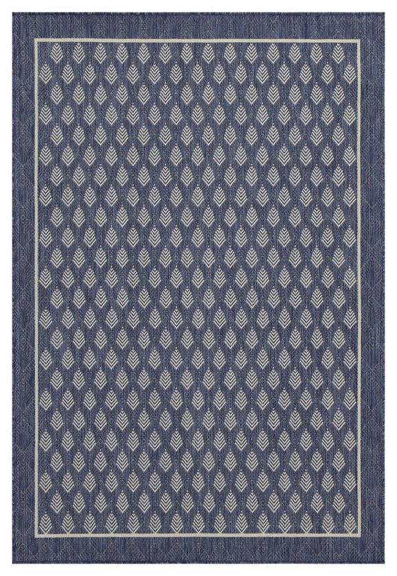 Blue area rug with repeating diamond pattern and dark outer border