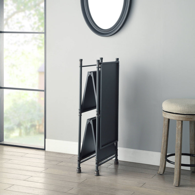 Black console table with bronze-toned accents, narrow side view and open shelves