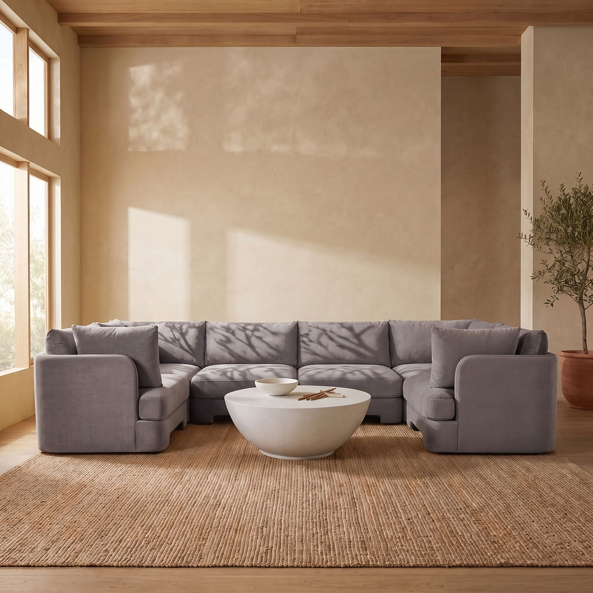 Light gray velvet U-shaped sectional sofa, 6-piece set with thick arm and seat cushions.