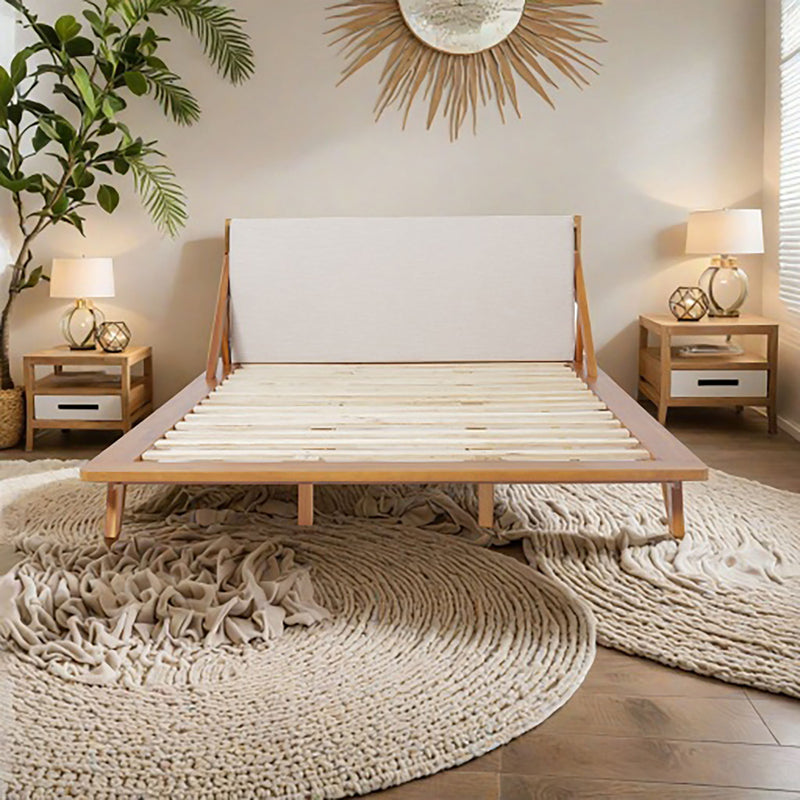 Fabric upholstered bed with beige headboard and slatted base, acacia wood legs