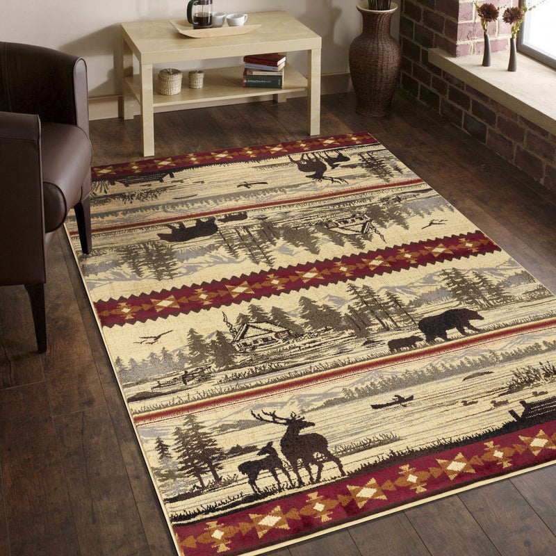 Cream lodge area rug with maroon geometric edge and black animal and cabin motifs