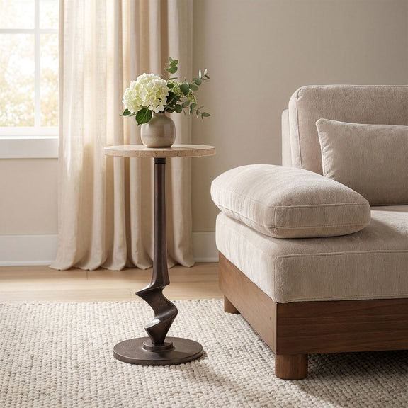 Dark metal aluminum side table with round top and sculpted pedestal base