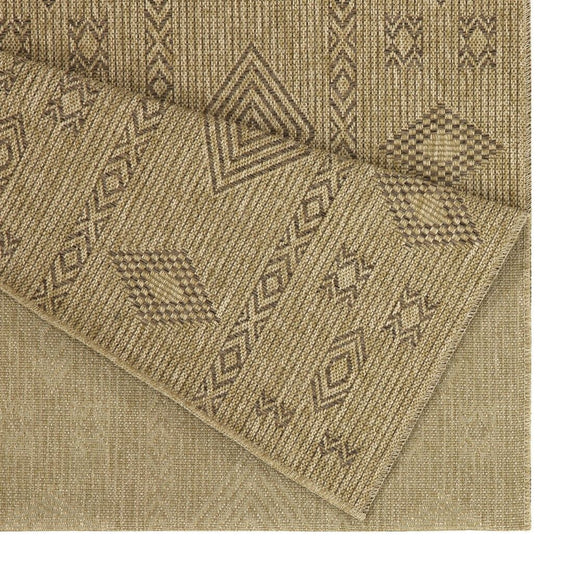 Mocha jute rug corner detail with geometric pattern and tightly woven texture