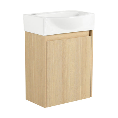 White ceramic bathroom sink with light brown two-door vanity cabinet