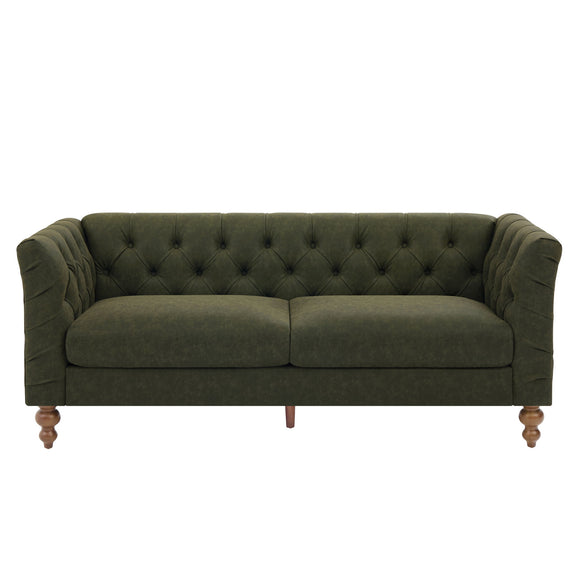Dark green chesterfield-style sofa with tufted back, flared arms, and wooden legs