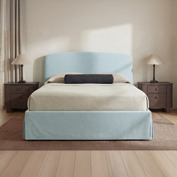 Dark brown nightstand with two drawers beside bed, square legs
